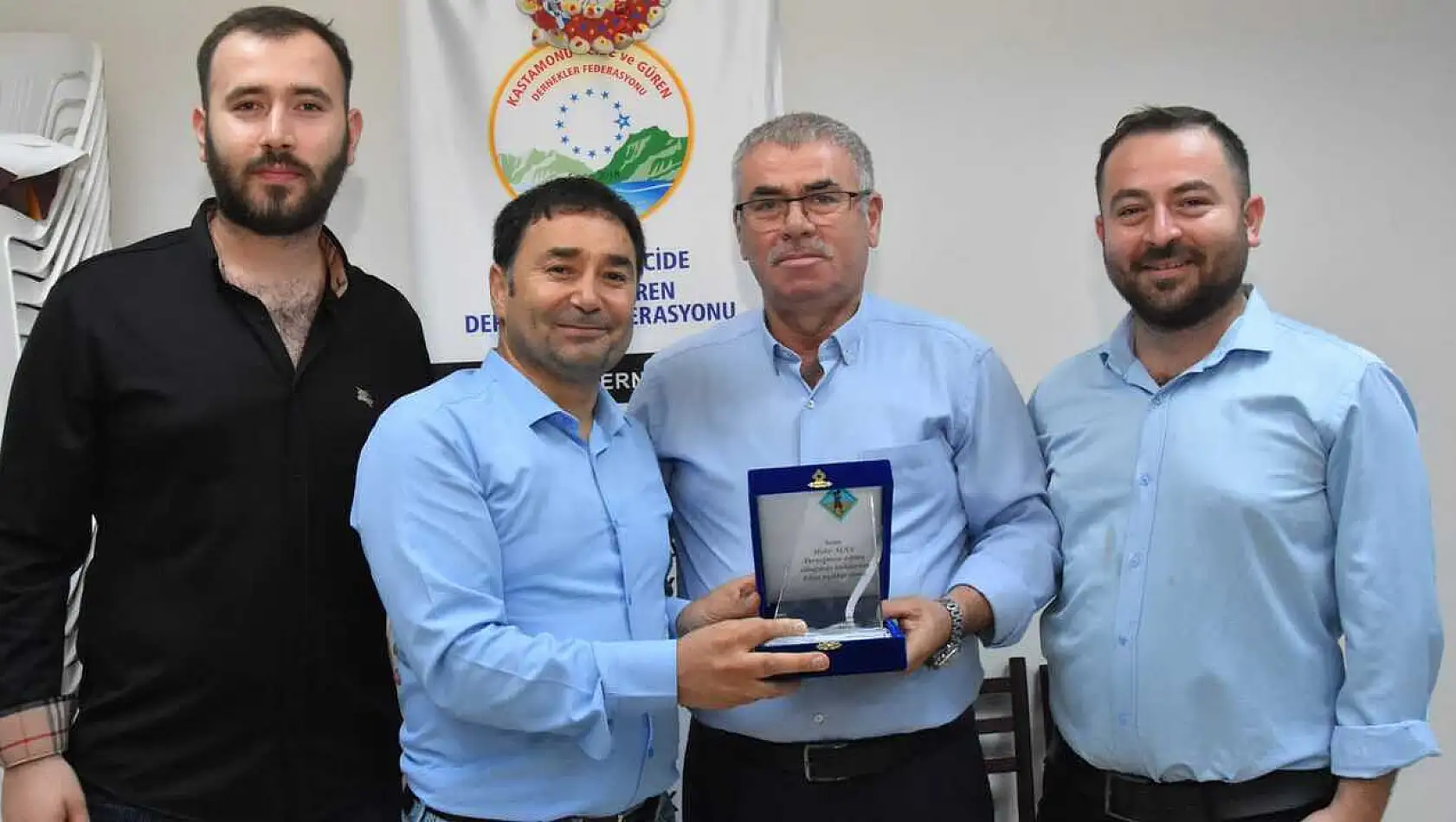 İş adamı Alan'a şükran plaketi