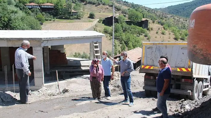 Yangınzede ailelere yapılacak yeni evlerin temeli atıldı